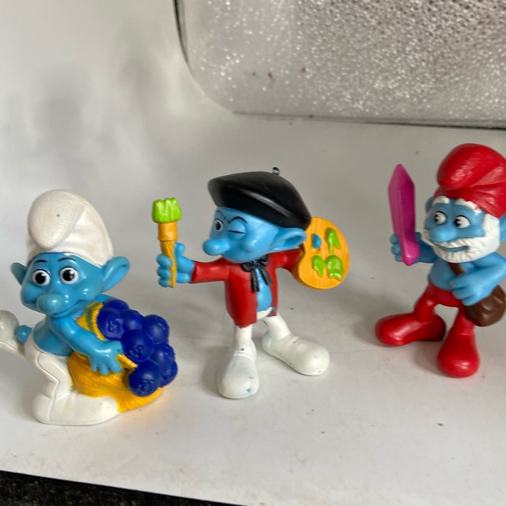 Smurfs 3 2011 & the artist 2011 & Papa Smurf 2013  (all for McDonalds all Peyo)